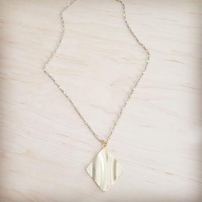 **Gilded Wave Pendant Necklace 257mb
