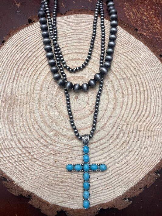 Western Turquoise Cross Three-Layered Necklace — Faux Pearl Trio with 3" Cross Pendant