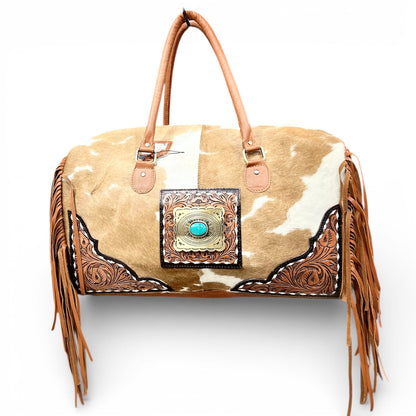 TAN TOOLED LEATHER & COWHIDE DUFFLE BAG