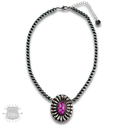 Western sunburst pendant on burnished silver bead necklace