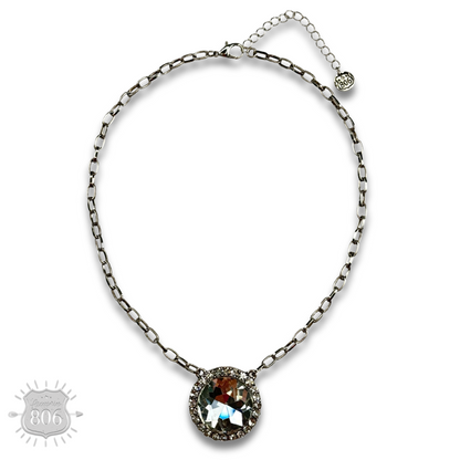 Large round pendant on silver link chain necklace