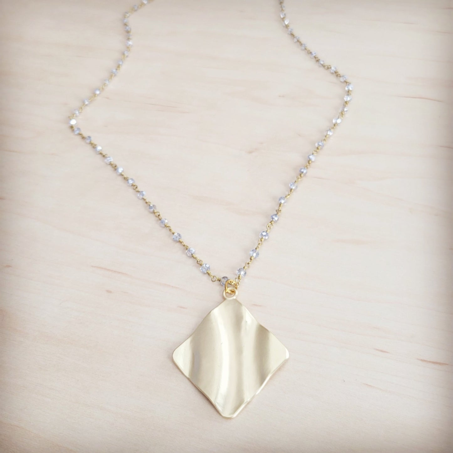 **Gilded Wave Pendant Necklace 257mb