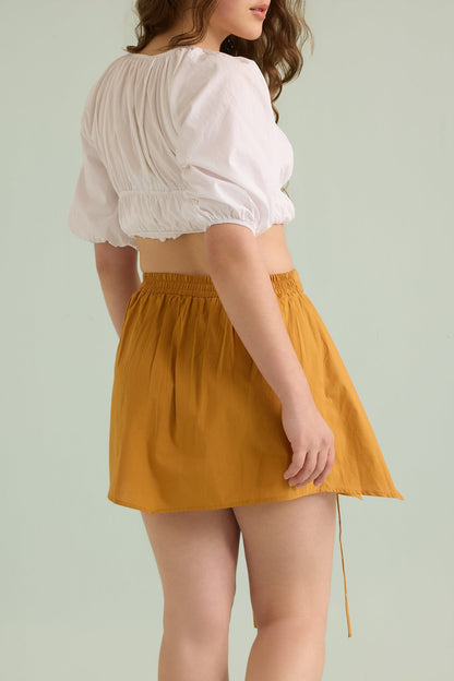 Marlee Patty Accented Skirt In Mustard