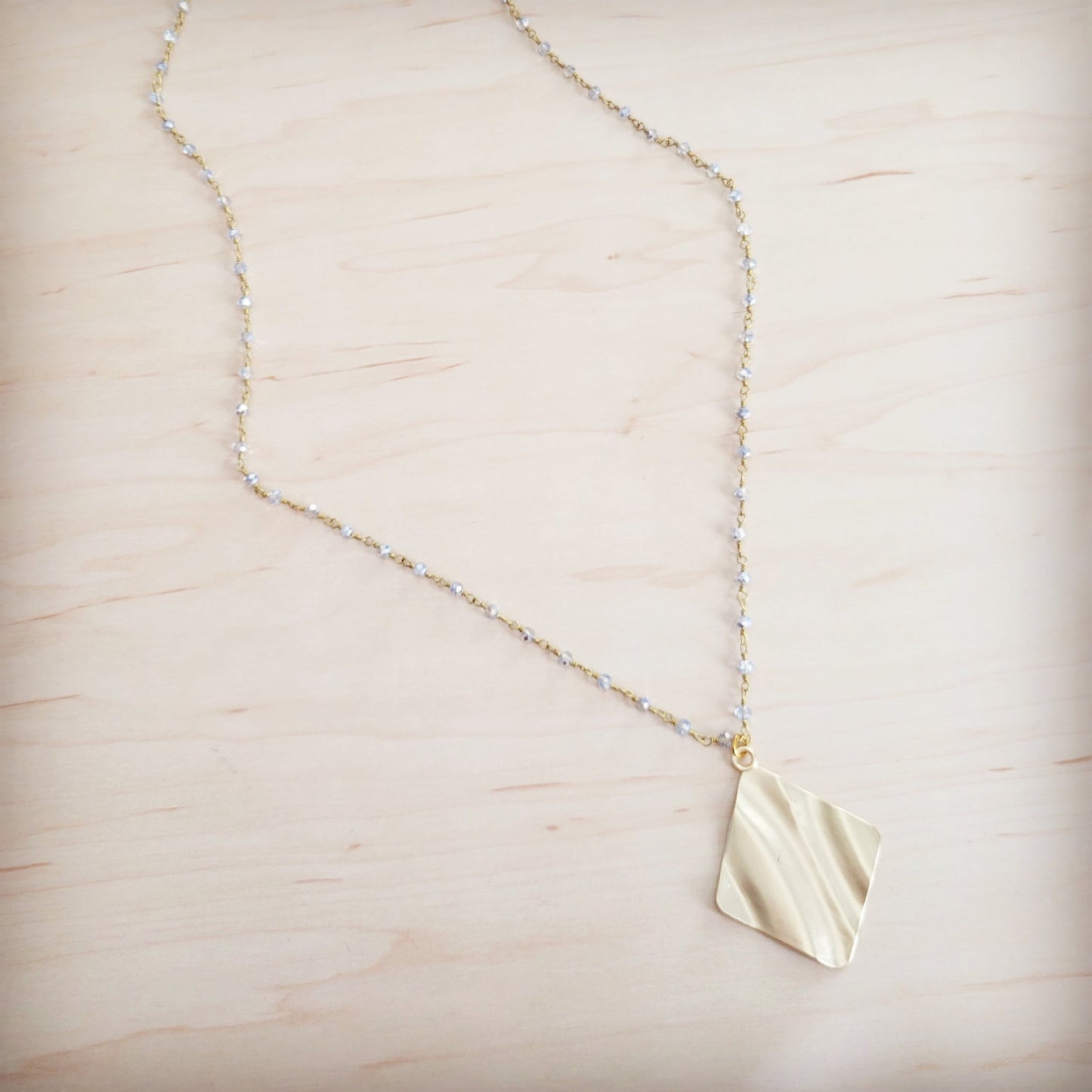 **Gilded Wave Pendant Necklace 257mb