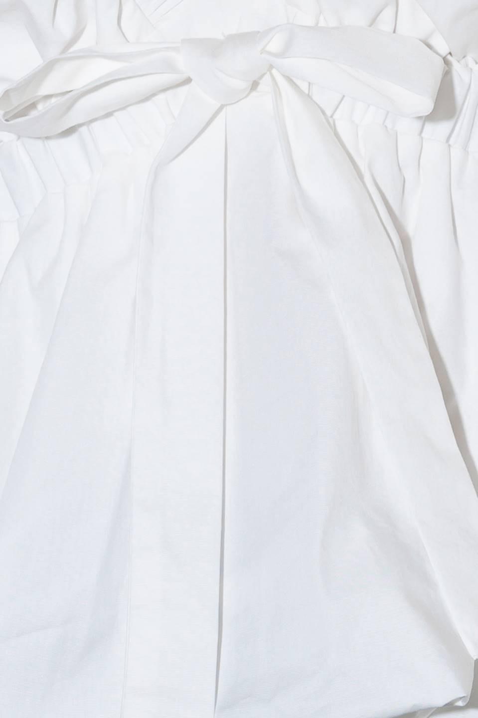 SLOW DOWN IN WHITE WOVEN TOP