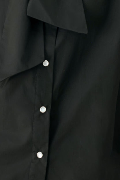MODERN STATEMENT BOW WOVEN TOP