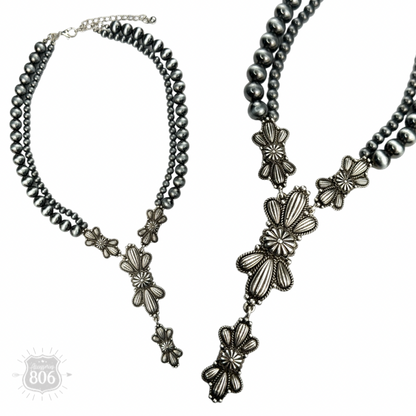 Western style pearl necklace with butterfly concho pendant