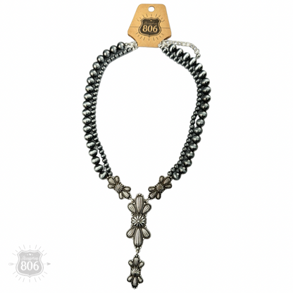 Western style pearl necklace with butterfly concho pendant