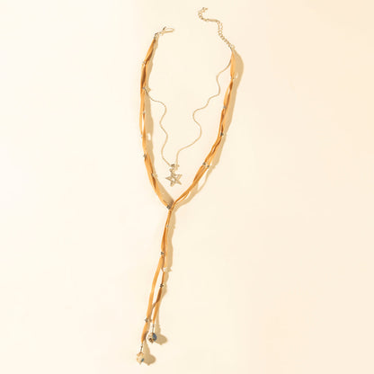 Myra Ranchlight Star Leather Necklace in Saddle Tan