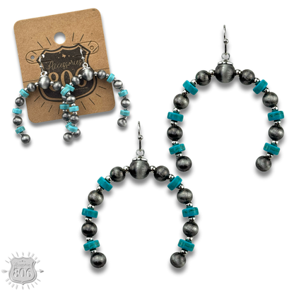 Turquoise, silver arched horn earring