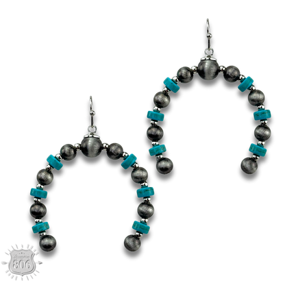 Turquoise, silver arched horn earring