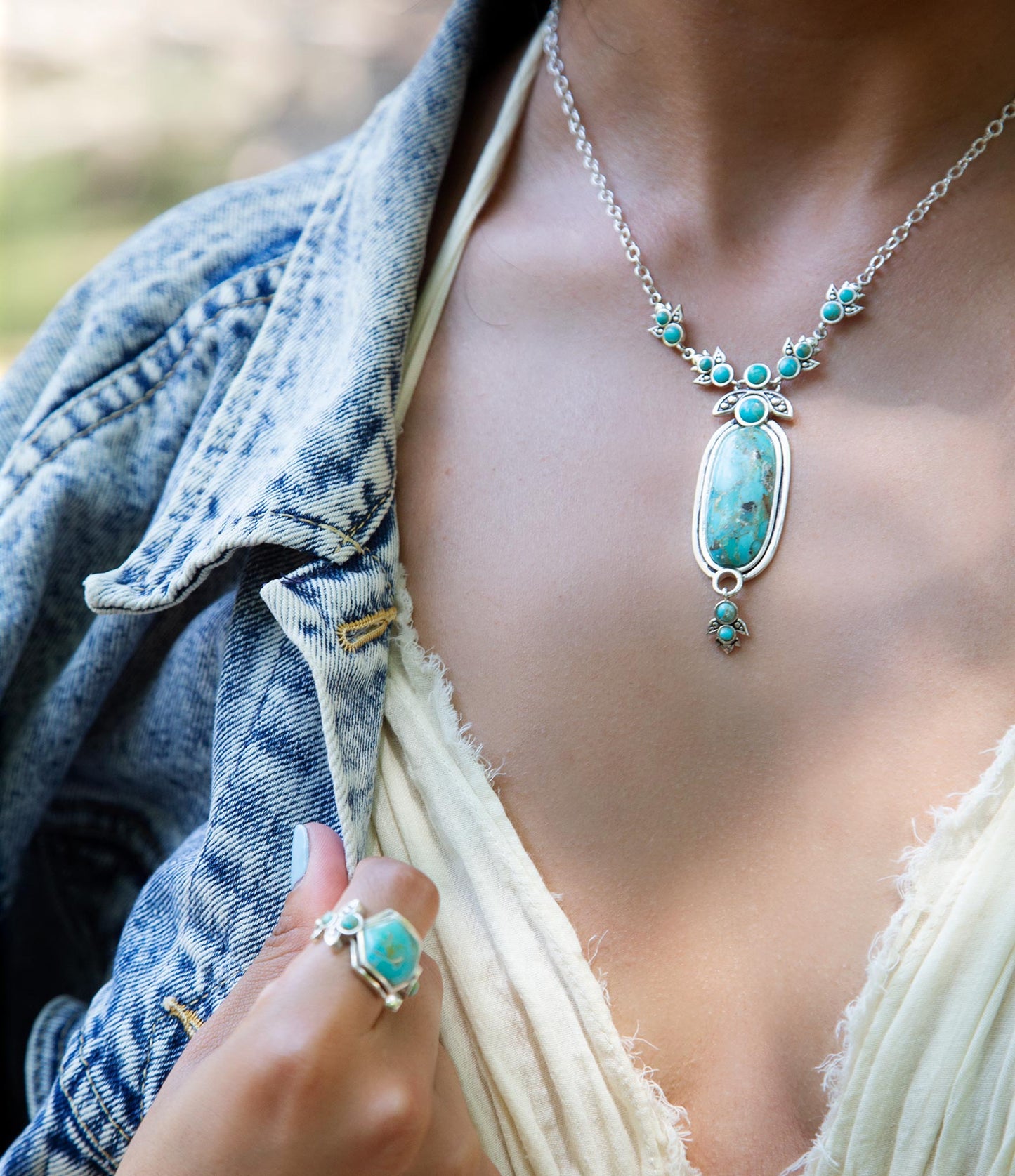 Emile Sterling Silver and Blue Turquoise Pendant Necklace
