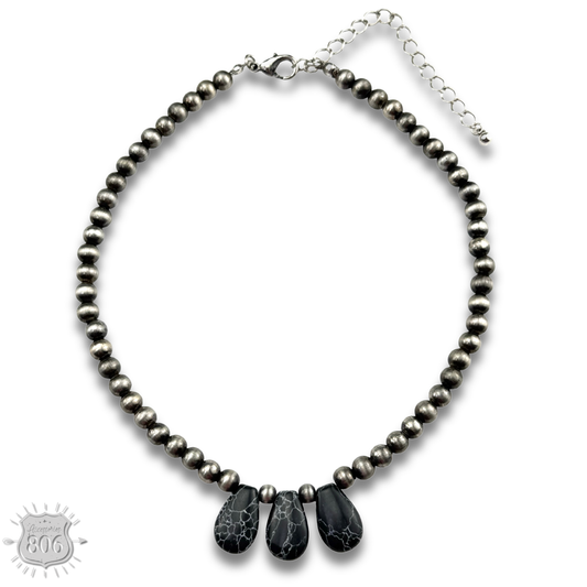 Three stone teardrop necklace