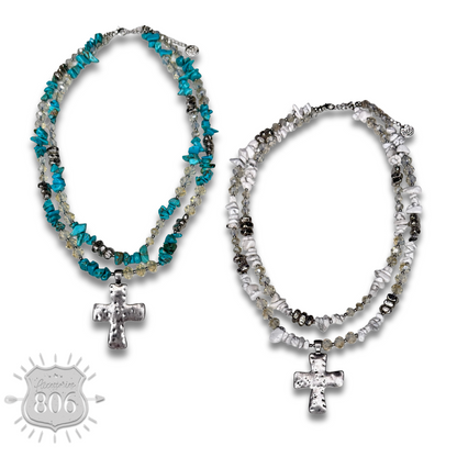 Textured cross pendant on chip stone double strand necklace