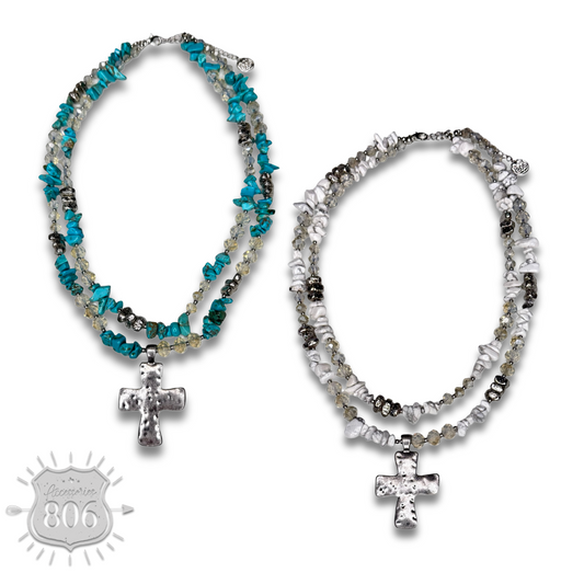 Textured cross pendant on chip stone double strand necklace