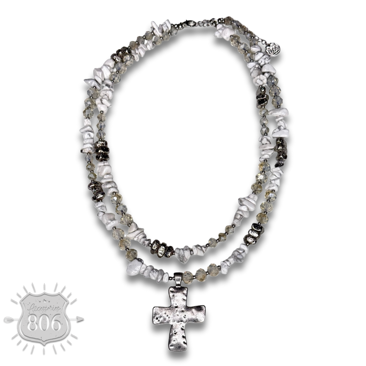 Textured cross pendant on chip stone double strand necklace