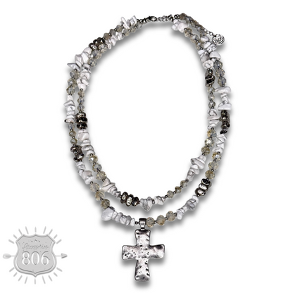 Textured cross pendant on chip stone double strand necklace