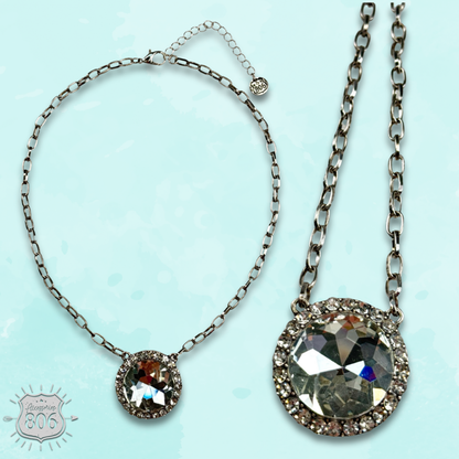 Large round pendant on silver link chain necklace
