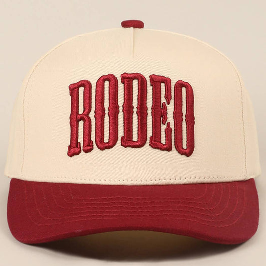 "RODEO" Two-Tone Embroidered Trucker Hat — Wine Red Cotton Canvas with Raised Lettering & 5-Panel Structure